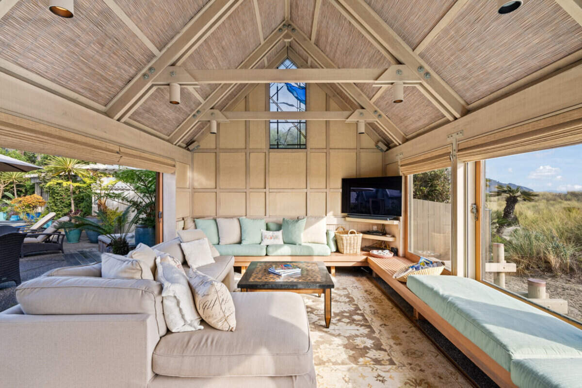 Each of the five bedrooms is housed in its own “Bali joglo,” a traditional Indonesian pavilion structure known for dramatic peaked roofs.