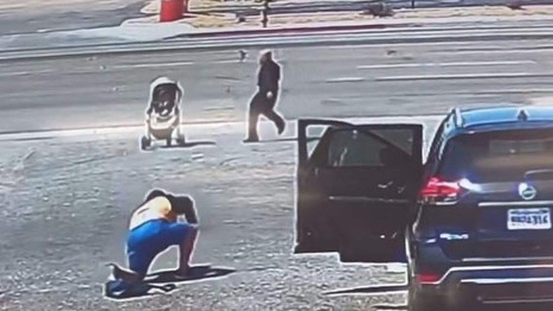 A man rushed to stop a baby stroller from rolling into traffic after a woman fell down in Hesperia, a California video shows.