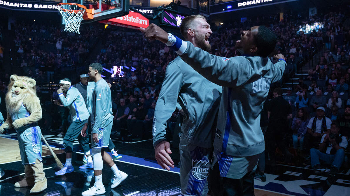 Sacramento Kings forward Domantas Sabonis, left, chest pumps guard De’Aaron Fox before the Nov. 20 game against the Detroit Pistons. The Kings have All-Star aspirations for both players.
