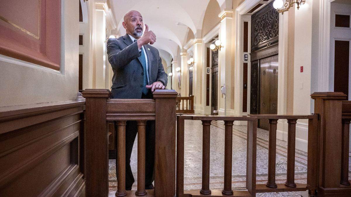 Lance Sidhu, assistant sergeant at the California Assembly, gives a thumbs up at state Capitol building after it was cleared because of a “credible threat” on Thursday.