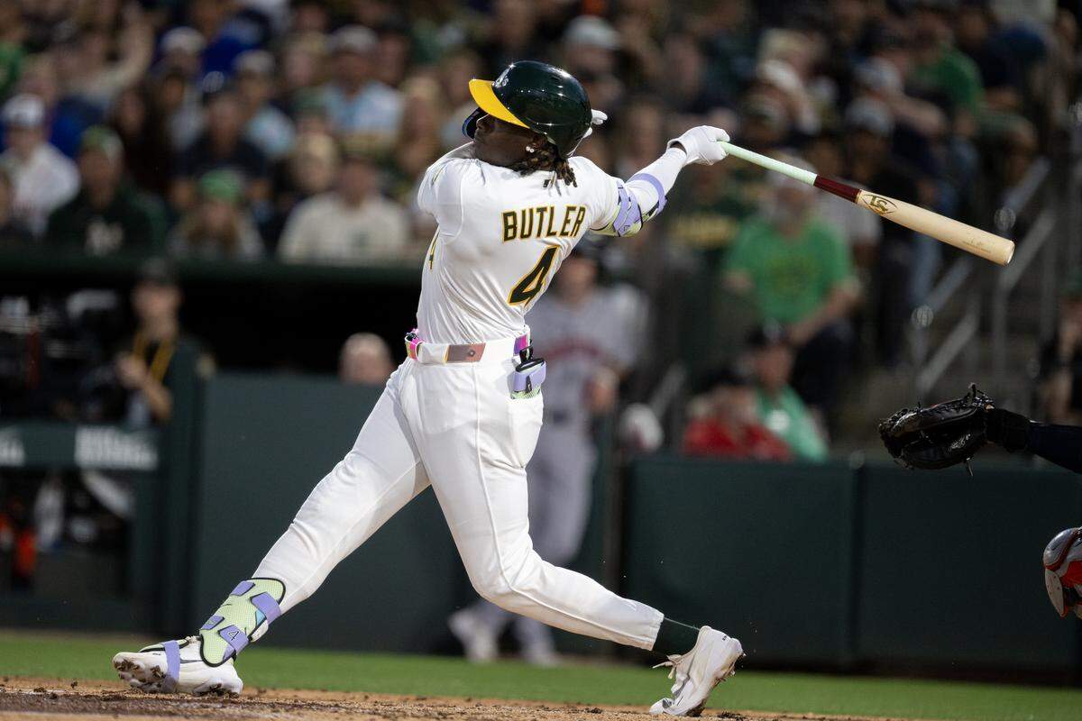 Athletics right fielder Lawrence Butler singles in the bottom of the third inning to drive in a run against the Houston Astros on April 3, at Sutter Health Park in West Sacramento. Butler has struggled so far this season, though A’s Manager Mark Kotsay recently praised him for a strong pinch hit at-bat against the New York Yankees.