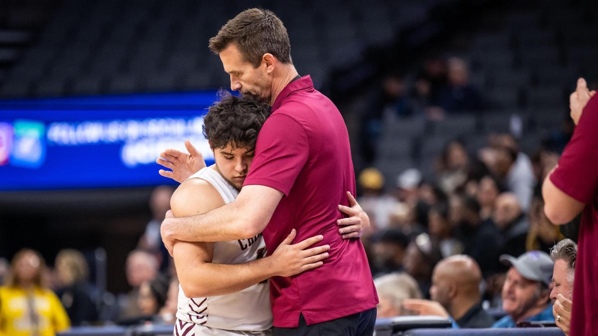 Sierra Chieftains head coach Ryan Watt consoles guard Nathan Kempen as he and other starters are pulled out of the game against the Lynwood Knights late in the fourth quarter of the CIF Division V high school boys basketball state final game Friday, March 10, 2023, at Golden 1 Center in Sacramento. Lynwood beat Sierra for the state title, 89-58.