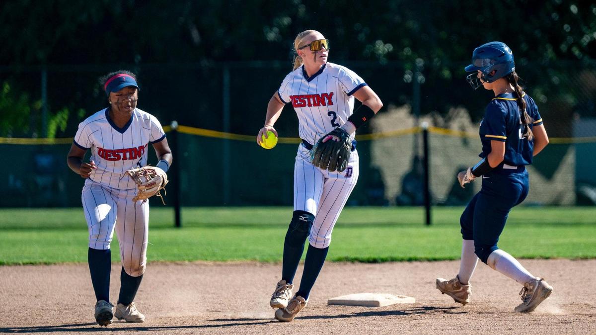 Destiny Christian Lions’ Maddilyn Woodcock (2) throws to first base after getting the out at base during a first-round CIF Northern California Division II Regional playoff game agains King’s Academy in Rosemont on Tuesday, June 3, 2025.