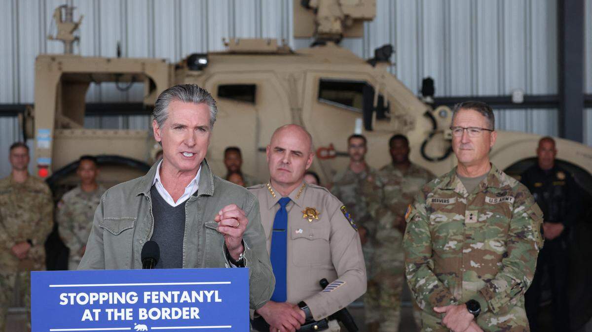 California Governor Gavin Newsom speaks alongside California Highway Patrol (CHP) Commissioner Sean Duryee and Major General Matthew Beevers, The Adjutant General of California, about California National Guard and CHP seizures of illicit drugs including fentanyl and border security operations during a press conference at Montgomery-Gibbs Executive Airport in San Diego, California on February 2, 2026. (Photo by Patrick T. Fallon / AFP via Getty Images)
