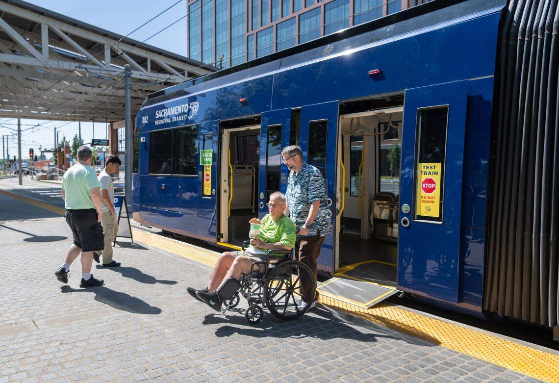 Members of the disability community and the general public tour Sacramento Regional Transit’s new S700 low-floor light rail train at the Township 9 station in Sacramento in June. Once station modifications are completed this summer, the new trains will begin service on the Green and Gold lines. Construction on Blue Line platforms is set to begin in the fall.
