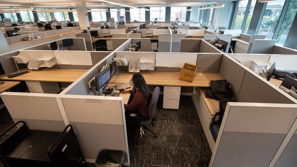 California Energy Commission manager Patricia Carlos works inside of the California Natural Resources Building on Friday, Nov. 19, 2021, in Sacramento. Carlos works from the building one to two days per week.