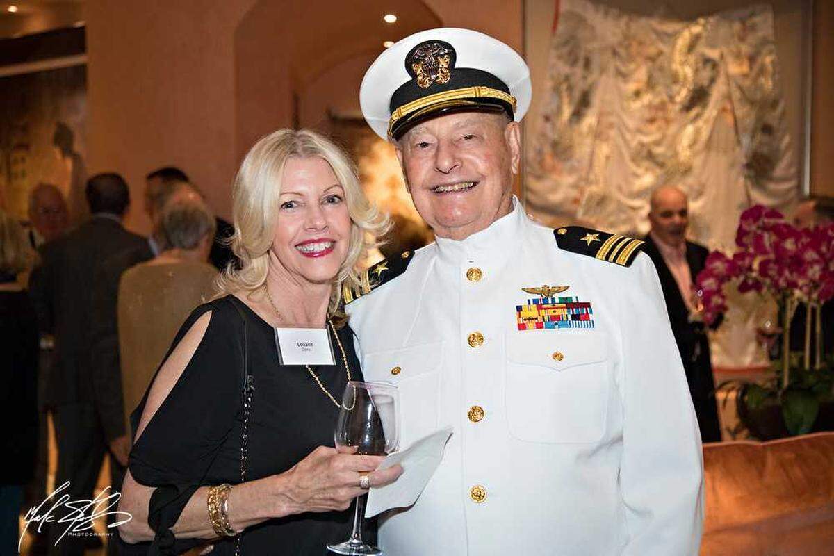 Lou Conter is seen with his daughter, Louann Daley, during the 75th annual remembrance of the attack on Pearl Harbor in Hawaii in 2016. Conter, the last survivor of the attack by the Japanese on the USS Arizona, died Monday at the age of 102, surrounded by family in Grass Valley.