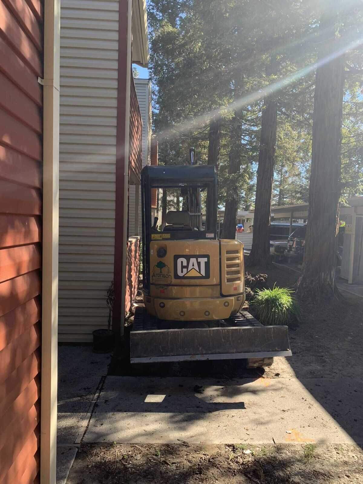 Firefighters on Wednesday Feb. 16, 2022, rescued an injured worker trapped between an excavator and a building in the 4400 block of Elkhorn Boulevard in North Highlands, California.