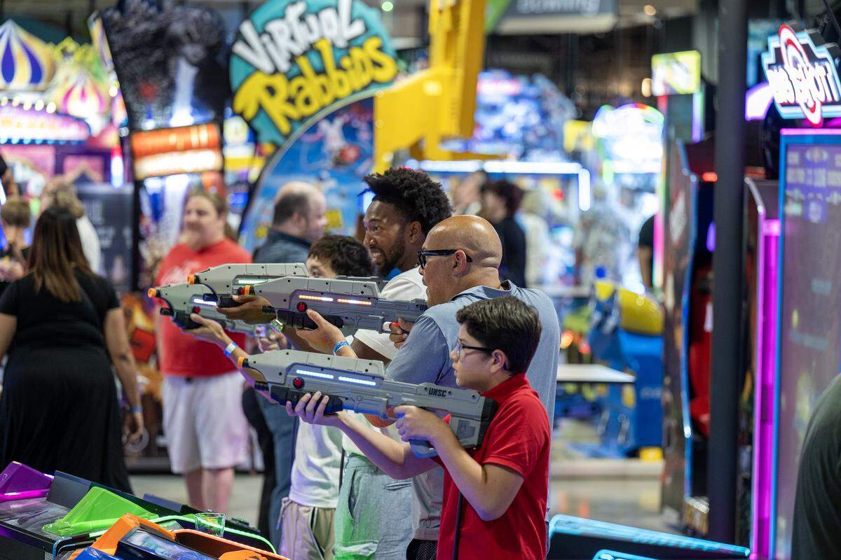 Guests play one of the 65 arcade games at the BLVD in West Sacramento on Wednesday.