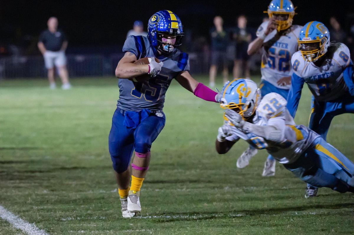 Sutter’s Luke Miller (15) runs the ball for a first down against Center on Oct. 7. The Huskies are the top seed in the Division V playoffs after a 10-0 regular season in their first year in the Sac-Joaquin Section.