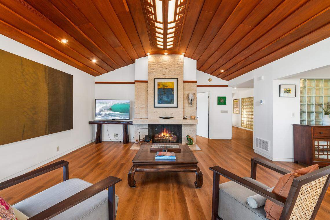 The mid-century modern estate spans 4,240 square feet with ocean views.