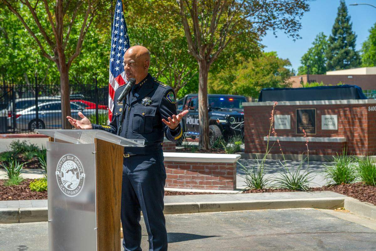 Elk Grove Police Chief Bobby Davis speaks after the unveiling of a memorial plaque honoring fallen Officer Ty Lenehan on Wednesday.