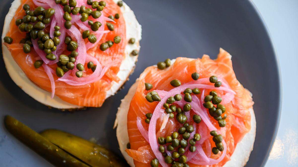 The Russ, a bagel with lox, schmear, tomato, capers and pickled onion is ready to serve at Solomon’s Delicatessen in downtown Sacramento.