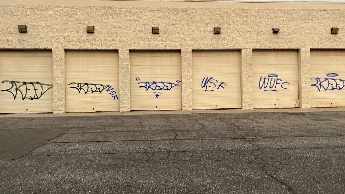 The Grass Valley Police Department arrested an 18-year-old man for felony vandalism, accusing him of tagging 28 businesses and one residence with graffiti.