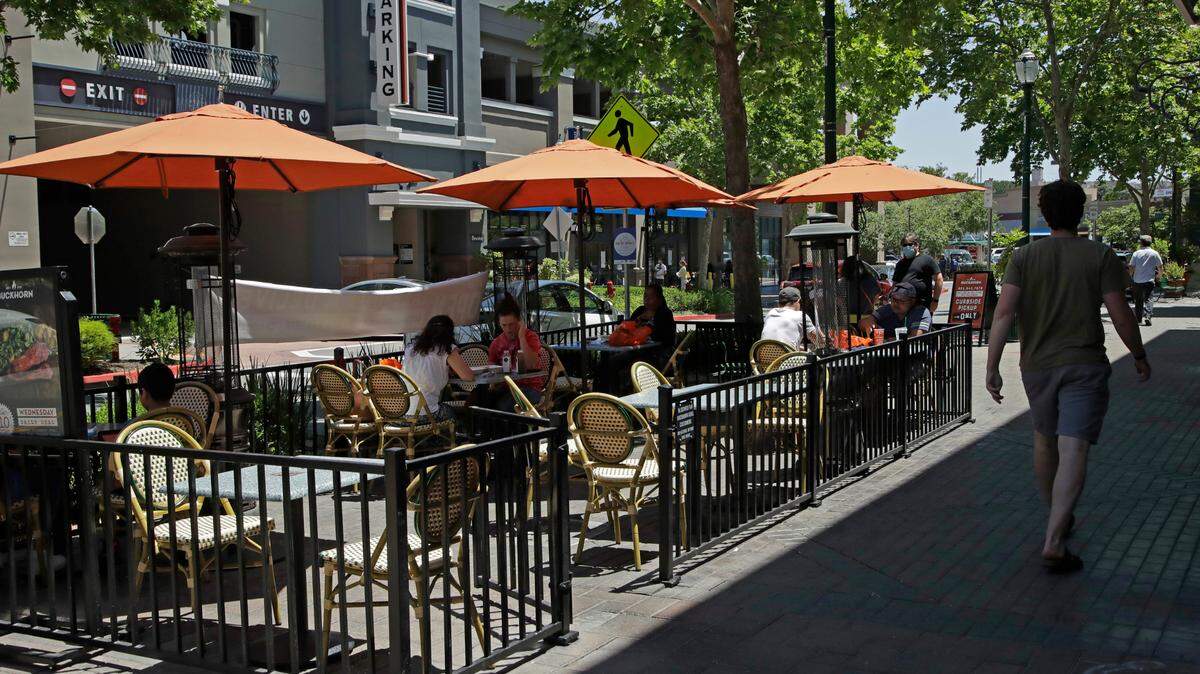 Customers of the Buckhorn Grill dine outdoors on July 1, 2020, in Walnut Creek. With seven active spots, the franchise’s restaurant in midtown will shutter and be replaced with two new locations.