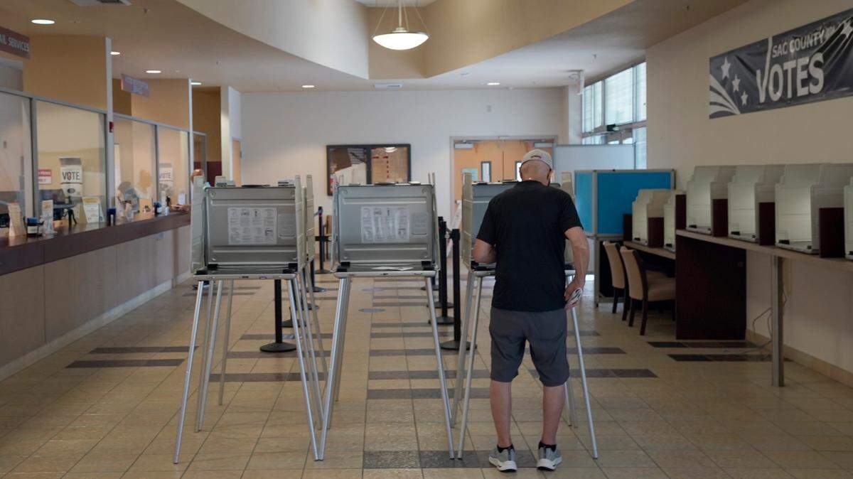 Robert Macias marks his ballot for the California primary at the Sacramento County Registrar of Voters office in Sacramento, Calif., Tuesday, June 7, 2022. (AP Photo/Rich Pedroncelli)