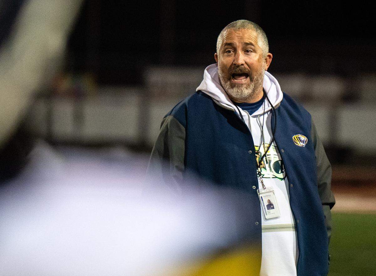 Inderkum coach Justin Reber gives advice to his players as his team holds a narrow lead in the fourth quarter over the Woodcreek Timberwolves on Oct. 17 in Roseville. Reber has officially been named Inderkum’s head coach for 2026 after holding the interim title in 2025.