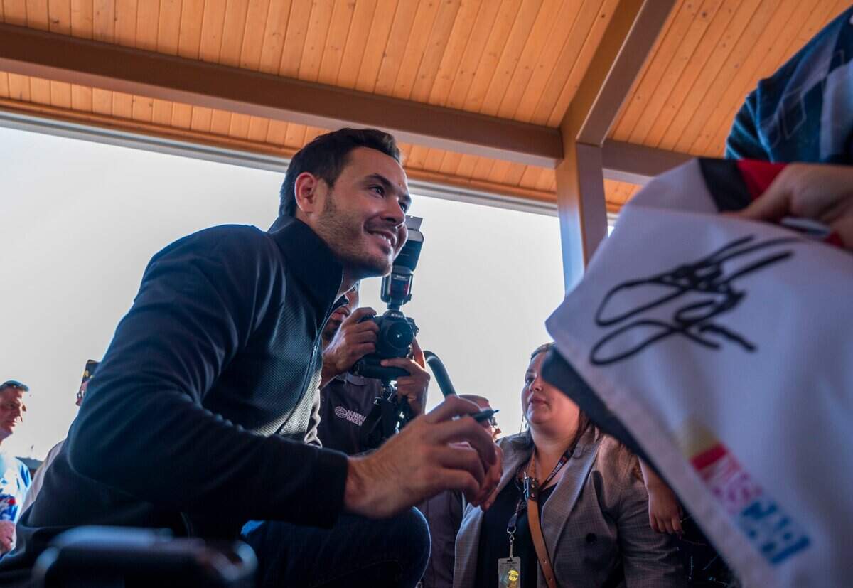 NASCAR champion and Elk Grove native Kyle Larson signs autographs at the Old Town Plaza in Elk Grove after a November parade in his honor.