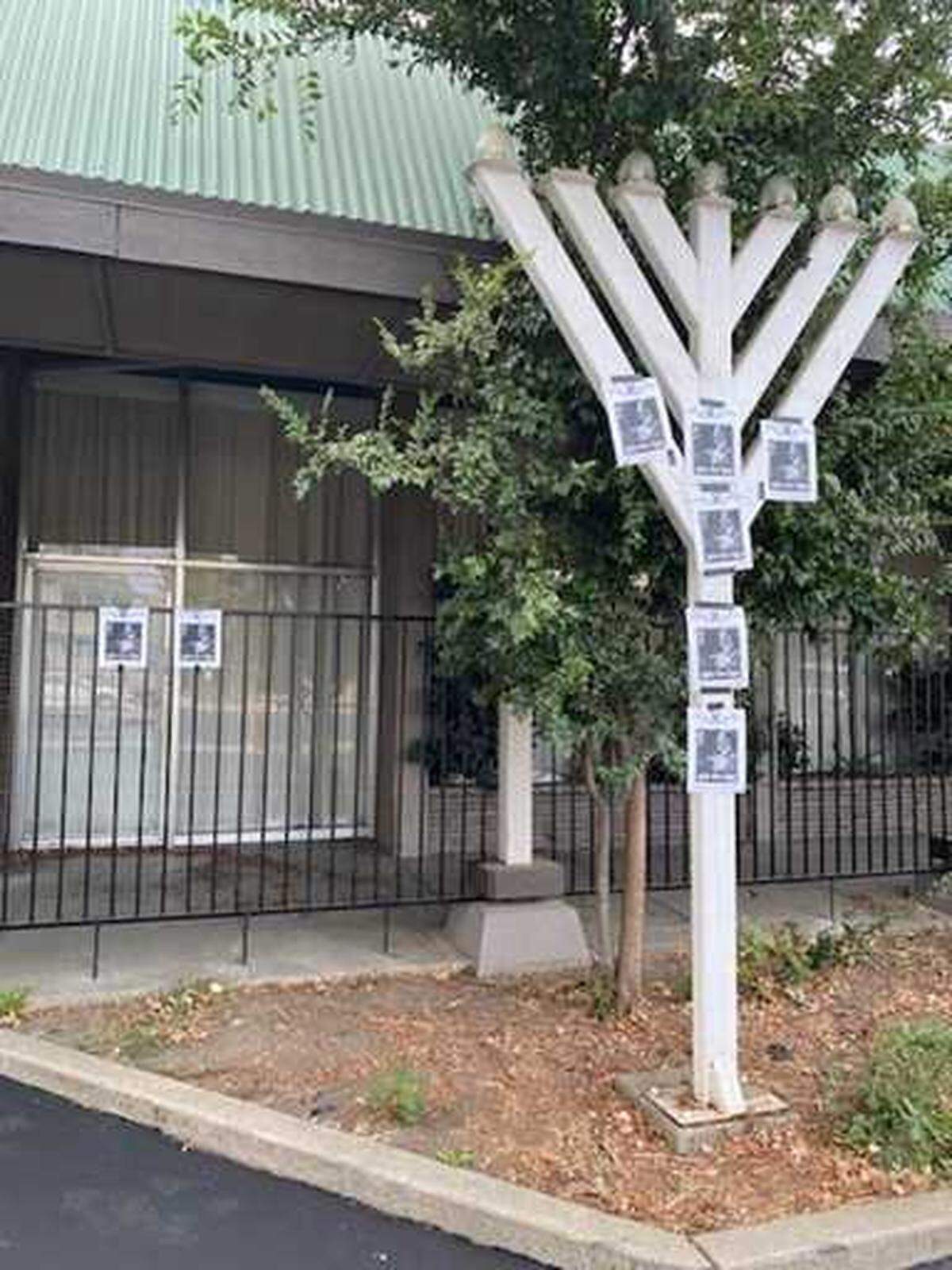 Antisemitic leaflets with pictures of Nazi leader Adolf Hitler were found Wednesday Oct. 21, 2021, taped to a menorah in front of the Shalom le Israel synagogue on Fair Oaks Boulevard in Carmichael, California.