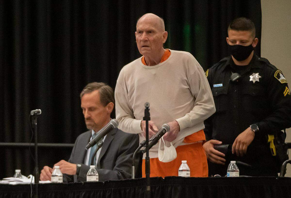Golden State Killer/East Area Rapist Joseph James DeAngelo stands and apologizes to his victims and their families in a makeshift Sacramento Superior Courtroom at Sacramento State in August 2020. He was sentenced to life in prison without the possibility of parole for 13 murders and a host of rapes and other crimes.