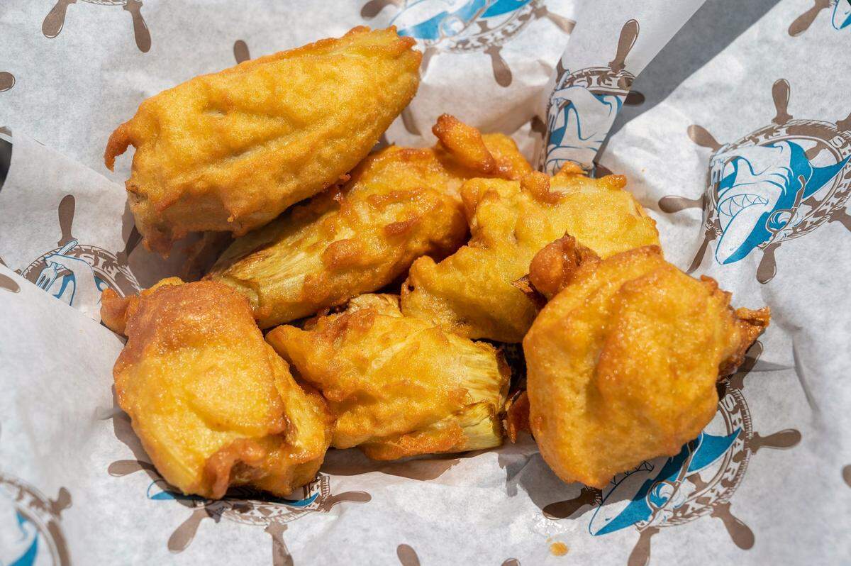 The deep fried artichokes is plated from Sharky’s Fish Fry at the California State Fair on Sunday.