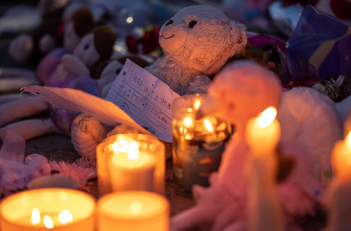 Messages and tributes are left by mourners for Samia Mora Gutierrez,13, Samantha Mora Gutierrez, 10, and Samarah Mora Gutierrez, 9, during a vigil Tuesday, March 1, 2022, outside Arden Arcade’s The Church in Sacramento. Community members held the vigil a day after the girls’ 39-year-old father shot and killed them along with chaperone Nathaniel Kong, then turned the gun on himself, inside the church on Wyda Way, authorities said.