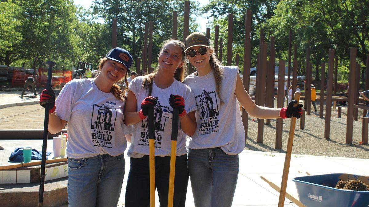 Volunteers Megan Barnett, Mia Barnt and Julia Olson work Tuesday, April 7, at Castle Park in Folsom, which is being renovated for nearly $1.1 million. They helped clear dirt for a group picnic area.