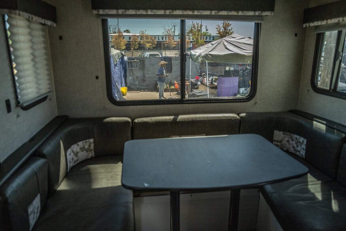 A view through the window of a city-owned travel trailer that was delivered Monday to the Camp Resolution homeless encampment in North Sacramento. The trailers are part of the recently signed agreement between the city, the camp and Sacramento Safe Ground that allows campers at the site to stay until permanent, stable housing is found for all its residents.