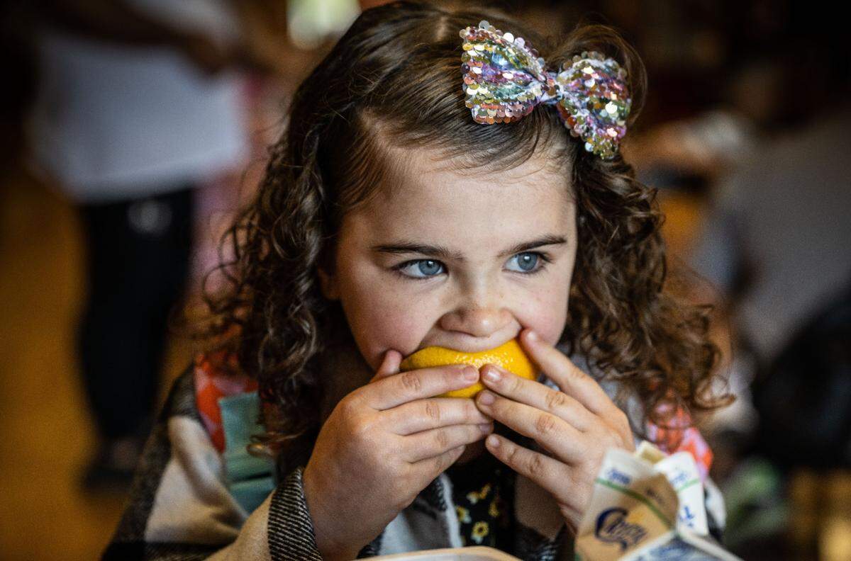 Lillyanna, a student at Navigator Elementary, eats breakfast with other students Tuesday during the first first day back to school. Folsom Cordova Unified School District served more than three million free meals last year.