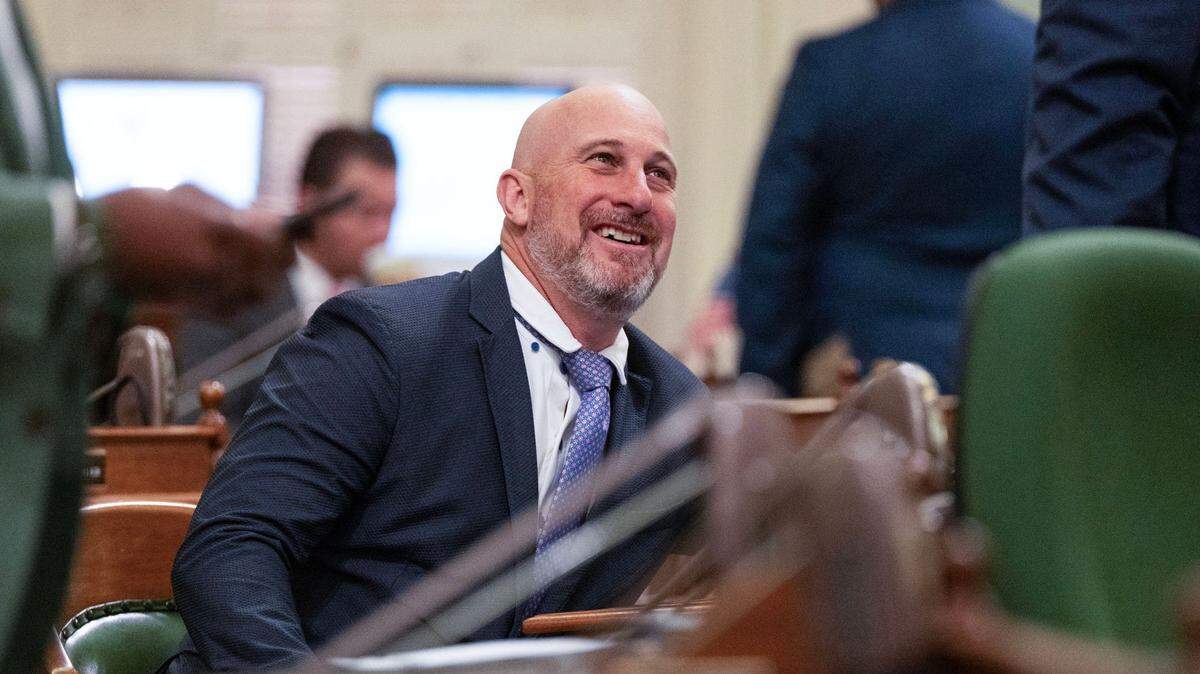 Assemblymember Heath Flora, R-Ripon, smiles before a session at the state Capitol on May 8, 2025.