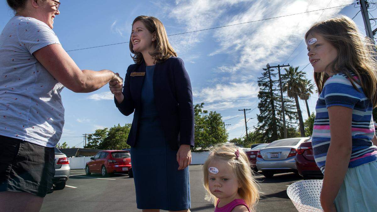 Congressional candidate Jessica Morse thanks a woman for voting in 2018 in Roseville.