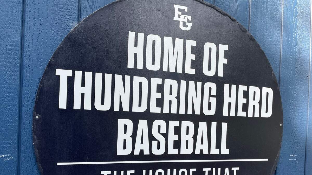 A sign outside the snack shack at the Elk Grove High School baseball field honors former coach Gary Dreher, who died after suffering a stroke during the 1996 season.