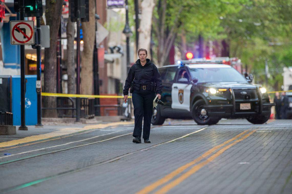 Sacramento Police Chief Kathy Lester walks the scene of the mass shooting in downtown Sacramento that left six dead on April 3, 2022.
