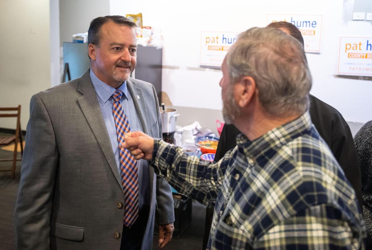 Pat Hume listens to a supporter at his Sacramento County Board of Supervisors campaign watch party at campaign offices on Election Day late Tuesday, Nov. 8, 2022, in Elk Grove. Jaclyn Moreno ran against Hume for the District 5 seat.