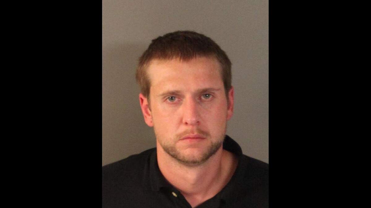 Christopher Michael Dougherty, 31, of Auburn was arrested Thursday on suspicion of animal cruelty after his family’s dog was found decapitated.