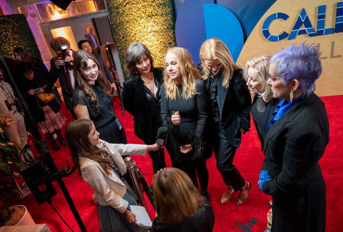 Members of the all-female pop punk band the Go-Go’s talk with a student media team from Elk Grove on the red carpet as inductees of the California Hall of Fame on Tuesday, Feb. 6, 2024, in Sacramento.