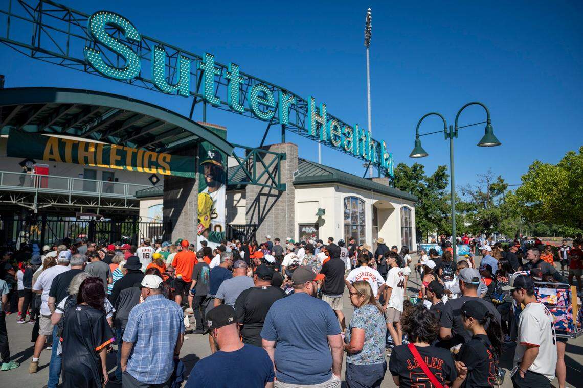 Athletics and San Francisco Giants fans wait for the Sutter Health Park gates to open before the teams play each other for the first time in West Sacramento on July 4. 