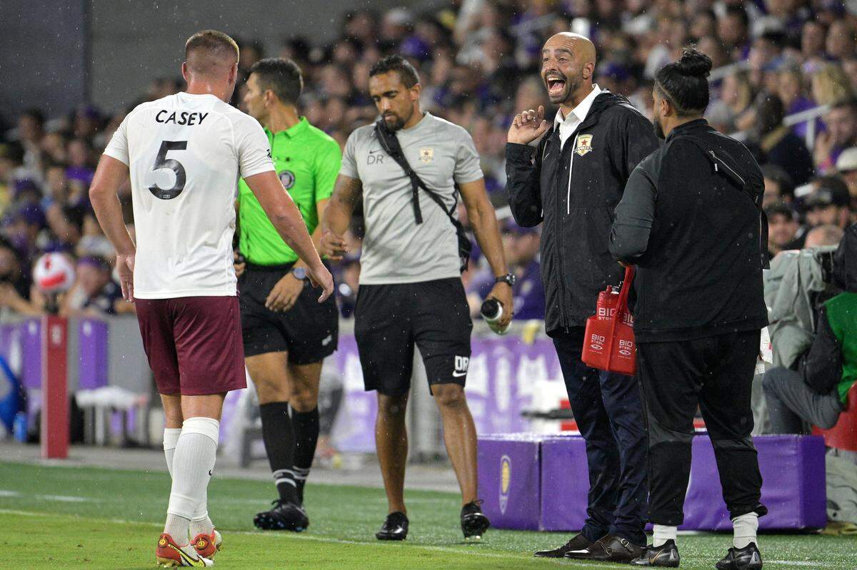 Sacramento Republic FC head coach Mark Briggs, second from right, calls out instructions to Dan Casey (5) during the first half of a U.S. Open Cup Final soccer match, Wednesday, July 27, 2022, in Orlando, Fla.