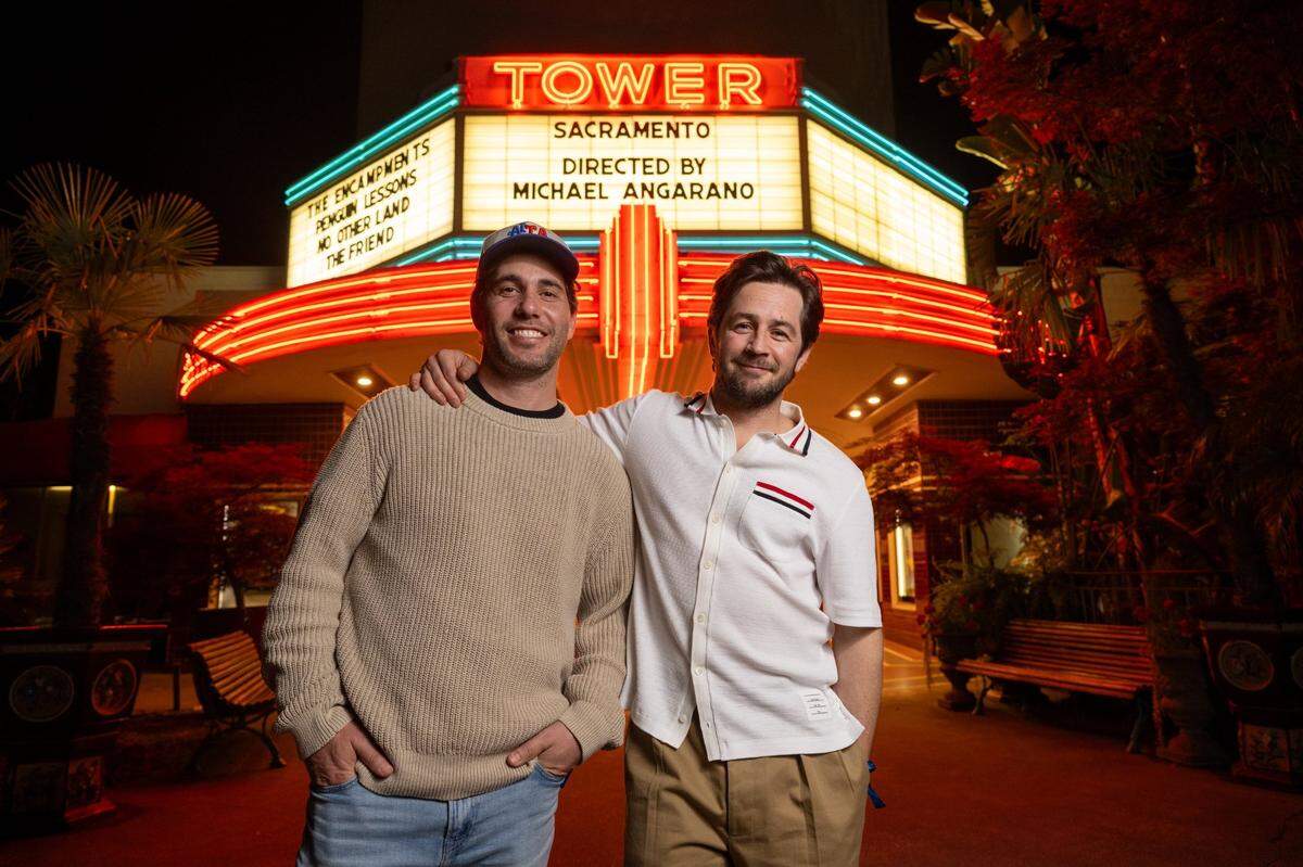 Actor-writer-director Michael Angarano, right, and co-writer Chris Smith stand outside the screening of their film ”Sacramento” at the Tower Theatre in Sacramento on Wednesday night.