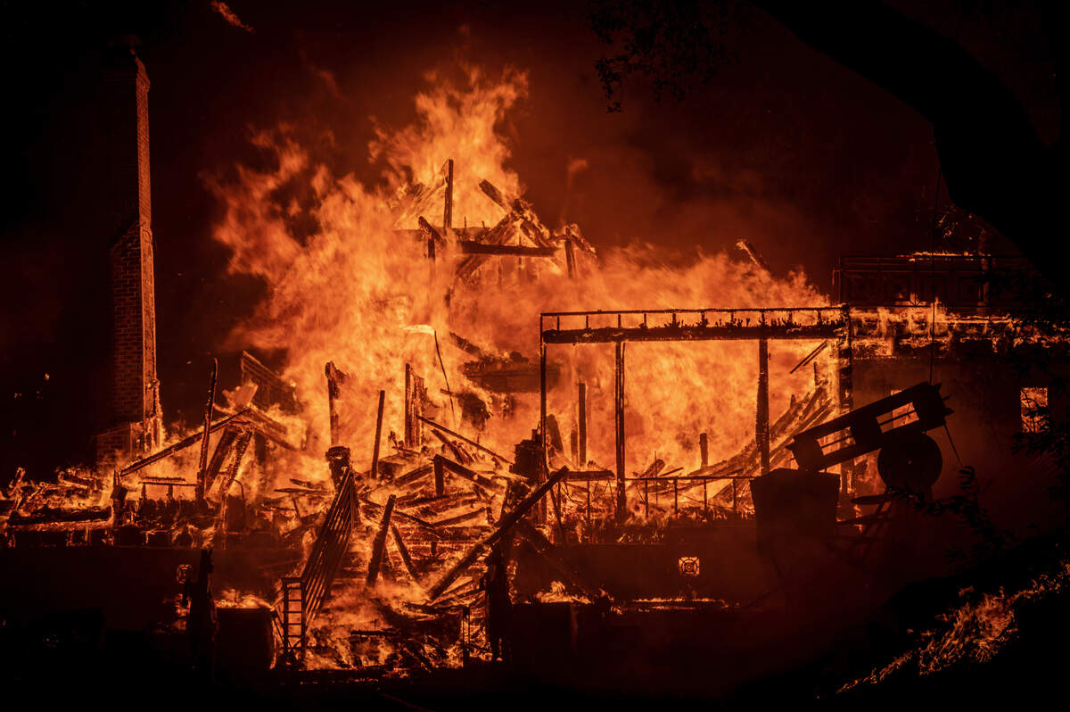 The Glass Mountain Inn goes up in flames as the Glass Fire burns along the Silverado Trail near St. Helena in the Napa Valley on Sunday night, Sept. 27, 2020.