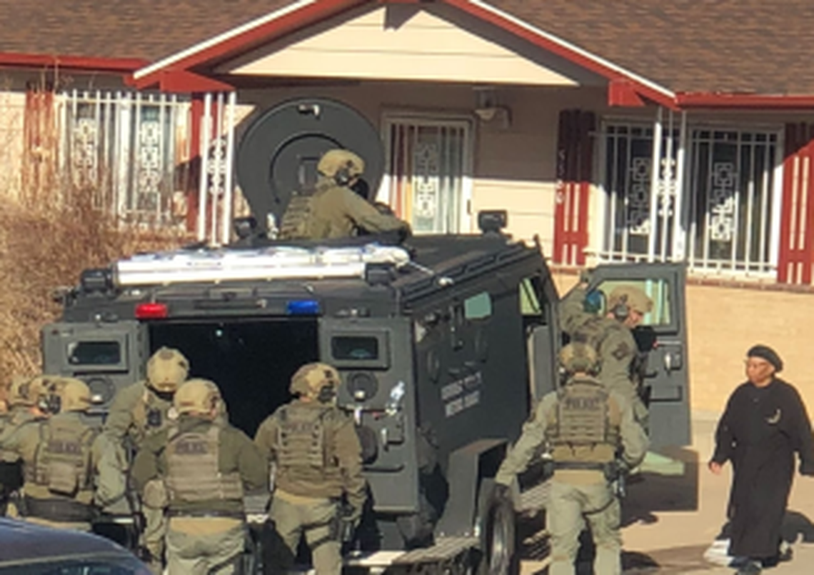 Johnson is seen with the SWAT team.