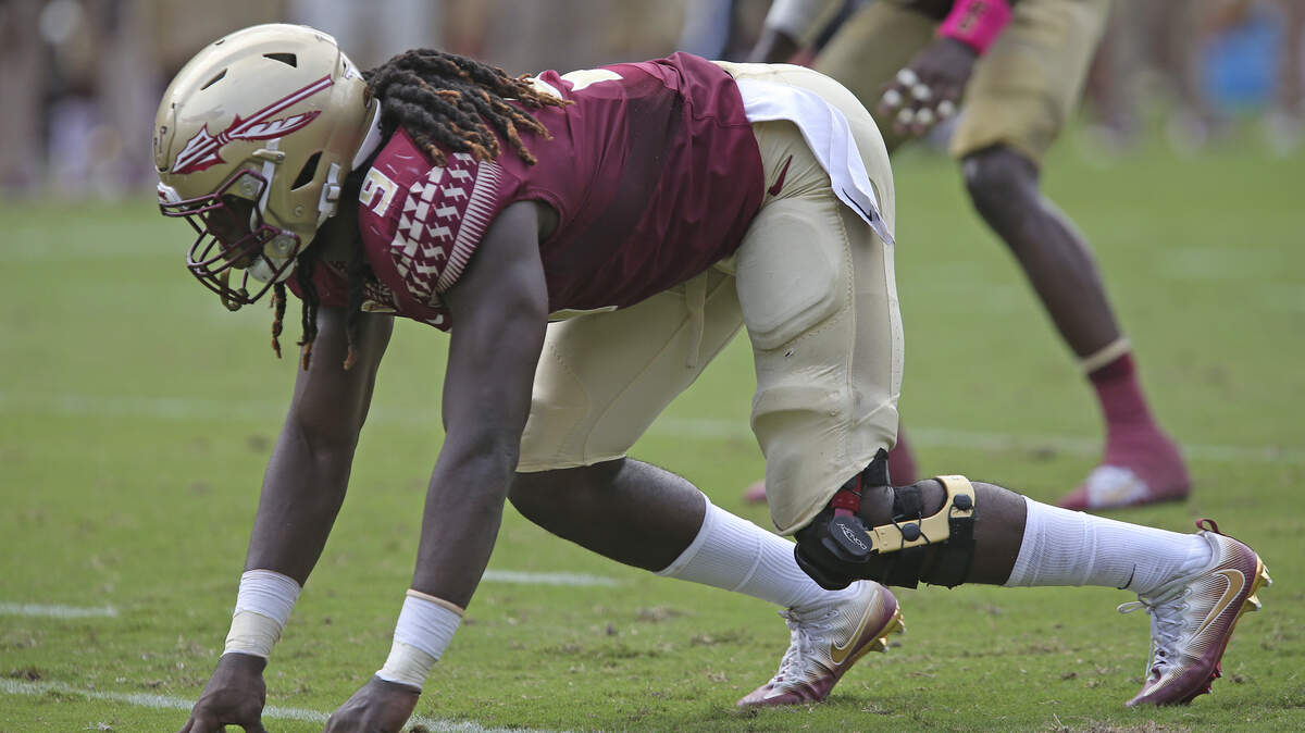 Florida State's Josh Sweat lines up at the start of a play during an NCAA college football game with Miami, Saturday, Oct. 7, 2017, in Tallahassee, Fla. Miami won 24-20.
