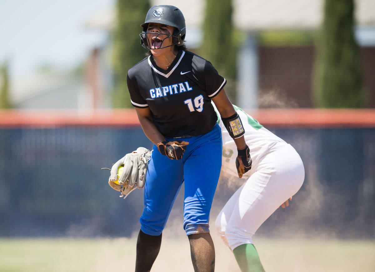 Capital Christian Cougars freshman Ayla Tuua celebrates hitting a double against the Dixon Rams during the fifth inning in the CIF Sac-Joaquin Section Division IV high school softball championship game Saturday, May 27, 2023, at Cosumnes River College. Tuua is now a senior, and Capital Christian is now Destiny Christian Academy.
