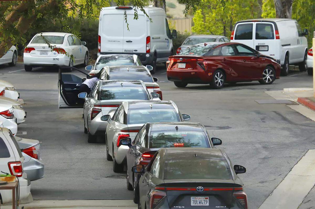 Hydrogen powered cars line up at a Los Angeles County hydrogen fuel station, where customers waited more than two hours, in 2021.