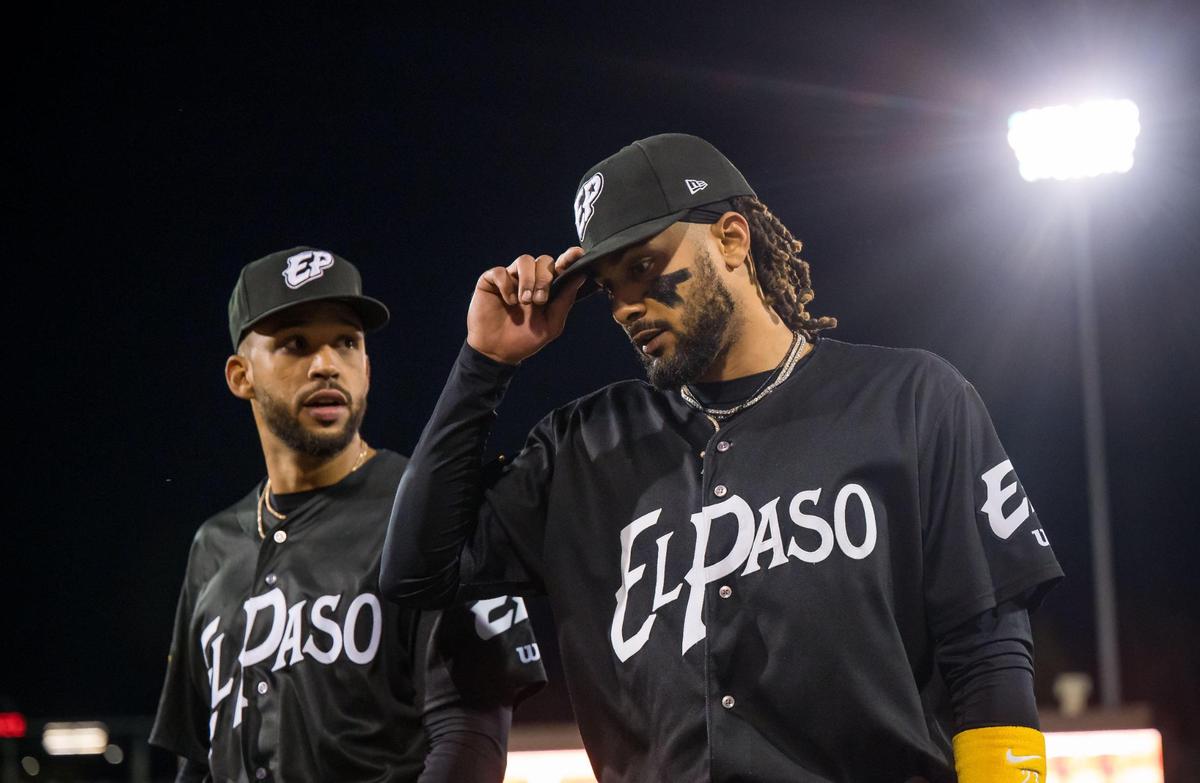 El Paso Chihuahuas right fielder Fernando Tatis Jr. (23), right, and center fielder Luis Liberato (4) walk off the field after then end of the fourth inning against the Sacramento River Cats play at the Triple-A Minor League Baseball game Tuesday, April 4, 2023, at Sutter Health Park in West Sacramento.