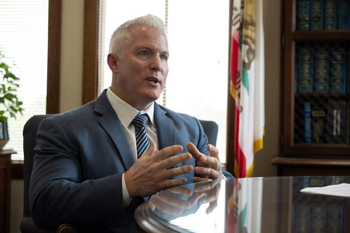 Yolo County District Attorney Jeff Reisig talks Friday at his Woodland office about prosecuting Carlos Reales Dominguez for the series of stabbings in Davis. Reales Dominguez is charged with two counts of murder and one count of attempted murder.