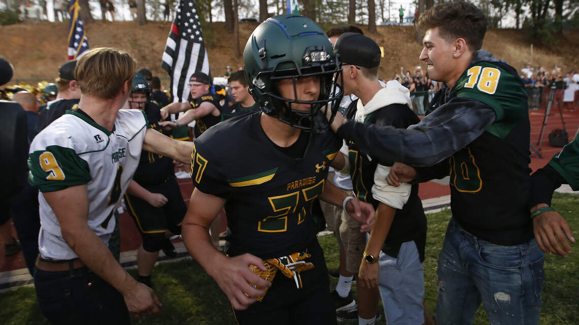 After hell hit Paradise, football team unites community in moving return to normalcy