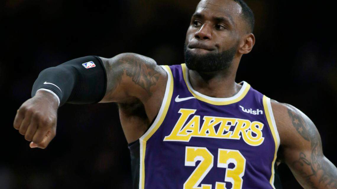 Los Angeles Lakers forward LeBron James celebrates after making a three-point shot against the Sacramento Kings during the second half of an NBA basketball game in Los Angeles, Friday, Nov. 15, 2019. (AP Photo/Alex Gallardo)