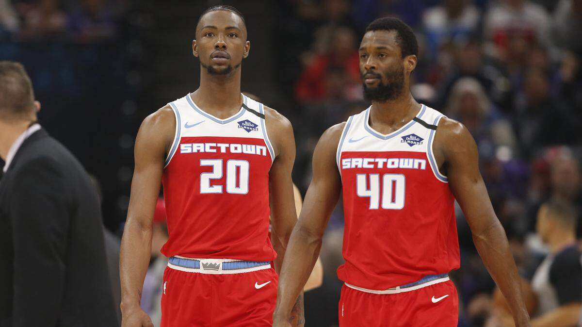 Sacramento forward Harry Giles III, left, and Harrison Barnes walk the floor during a game in Miami last week.
