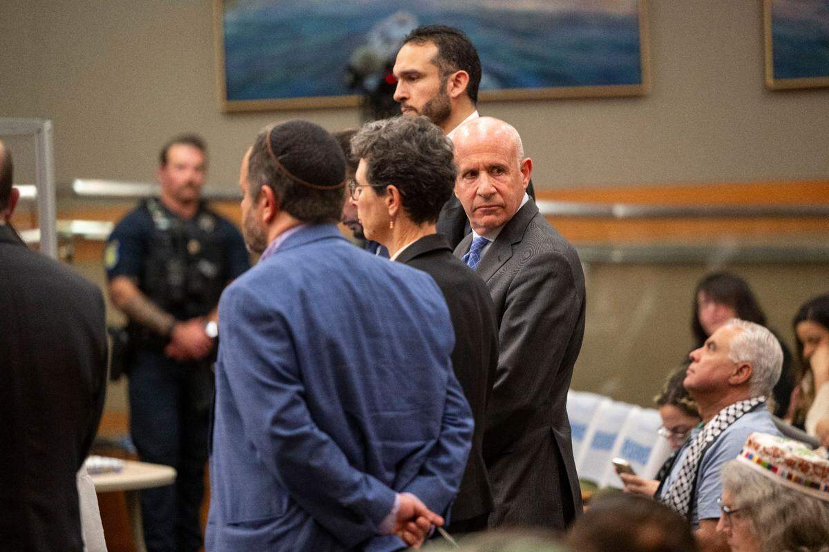 Sacramento Mayor Darrell Steinberg is flanked by local leaders of Sacramento’s Jewish and Muslim communities while making comments to the council to vote Tuesday on a Gaza cease-fire resolution proposed by leaders in Sacramento’s Jewish and Muslim communities.